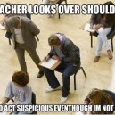 Teacher looks over shoulder
